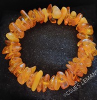 Multi-colored Baltic amber bracelet strung on a flexible rubber band