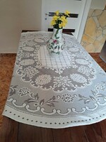 Beautiful machine-made oval lace tablecloth