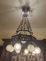 Wrought iron chandelier from the beginning of the 20th century. It was renovated years ago. Hunter to castles, big e