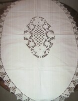Beautiful white floral rosette oval tablecloth with a lace edge
