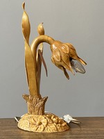 Carved wooden table lamp in the shape of a flower is a unique carving craft piece