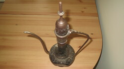 Copper teapot with an oriental motif