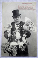 Antique humorous New Year's Eve photo postcard top hat gentleman with lots of gifts bouquet baby rocking horse