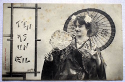 Antique photo postcard of a lady dressed as a geisha