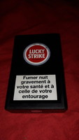 Old plastic interestingly openable lucky strike cigarette box according to the pictures
