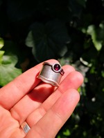 Silver ring with garnet stones