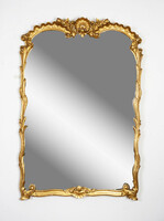 Gilded wood framed mirror decorated with a shell motif