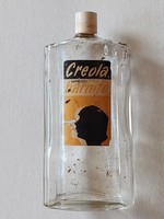 Old glass creola sunless tanning retro bottle