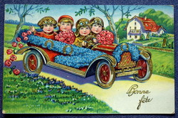 Antique gold pressed graphic greeting card for children with automobile and lucky horseshoe