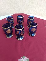 A set of six blue, richly gilded, stemmed glasses with a broken bottom, 12 cm high,,