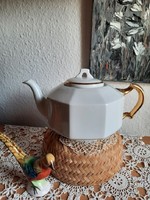 Antique porcelain teapot, with gilded decoration, marked 