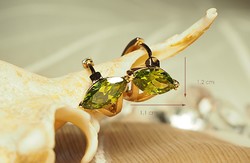 Gold-colored fashion jewelry earrings (goldfilled) with an olive green stone