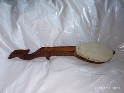 Carved wooden guzla, folk string instrument missing