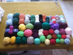 Large package of yarn of mixed colors, thickness and composition for knitting and crocheting. Its total weight is 1.80 kg.