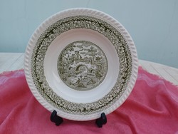A spectacular porcelain deep plate