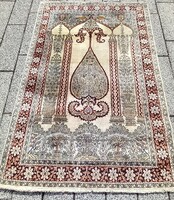 Hand-knotted silk carpet is negotiable