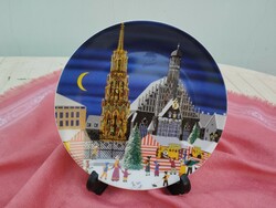 Christmas street scene drawing on a porcelain plate
