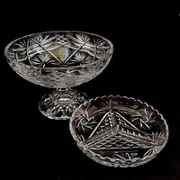 A crystal serving bowl with a base and a divided glass serving bowl in one