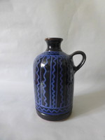 Old glazed ceramic jug, bottle