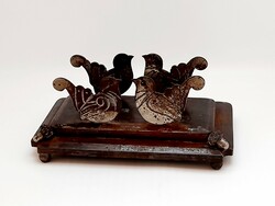 Bird-shaped, acorn cast iron holder, storage