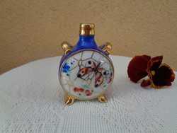 Zsolnay small jug , butterfly - floral  and hand-painted , heavily gilded , shield-marked