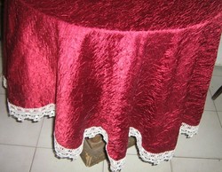 Elegant burgundy crumpled silk tablecloth with a lace edge