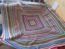 Cheerful colorful hand crocheted bedspread.