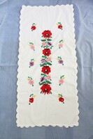 Long white embroidered tablecloth
