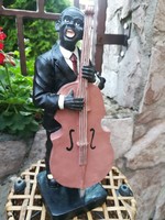 Musician figurine with double bass, 24 cm high