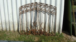Small wrought iron Art Nouveau gate with two wings.