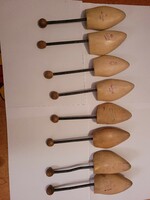 4 Pairs of spring-loaded wooden stilts in one