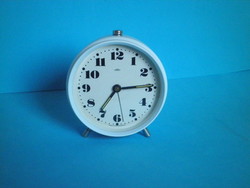 Traditional prim mechanical table rattle clock