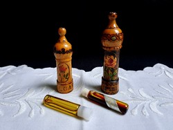 2 Old Bulgarian Bulgarian rose oil painted burnt ornaments in a wooden holder, the bottles are half full
