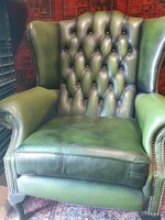 Poison green original English chesterfield real leather wingback armchair. Unfortunately, the leather surface is a bit worn
