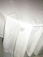 Beautiful hand-crocheted embroidered azure cream-colored tablecloth
