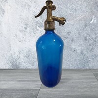 1931, blue soda bottle, with sandblasted inscription and pattern. Antique pewter head.