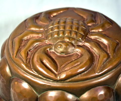 Red copper casserole dish with crab relief pattern!