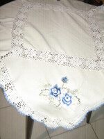 Beautiful hand-crocheted edge and crocheted inset machine-embroidered blue floral tablecloth