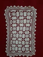 Breathtakingly delicate crocheted lace tablecloth