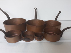 Set of 7 red copper dishes inside and out