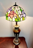 Tiffany table lamp with antique gold colored ceramic base
