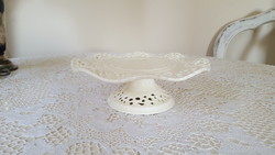 A wonderful openwork, lacy cream white ceramic cake plate with a base
