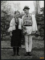 Larger size, photo art work by István Szendrő. Folk costume of a young couple from Gyimesközéplok (Transylvania).