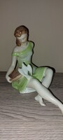 A drasche quarry cinderella in a bright green dress, a dove girl