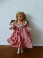 Doll in antique pink dress
