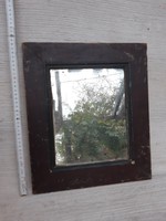 Old mirror with wooden frame