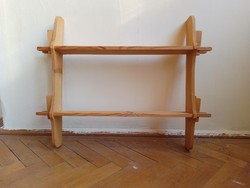 Old kitchen wooden shelf for spices, rustic folk style, made of pine, cantilevered, wedged