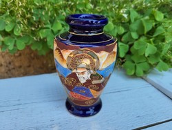 Japanese porcelain vase with hand relief painting