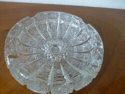Old lead crystal ashtray with a wind rose pattern in the middle