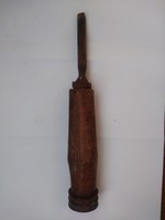 Old chisel with wooden handle